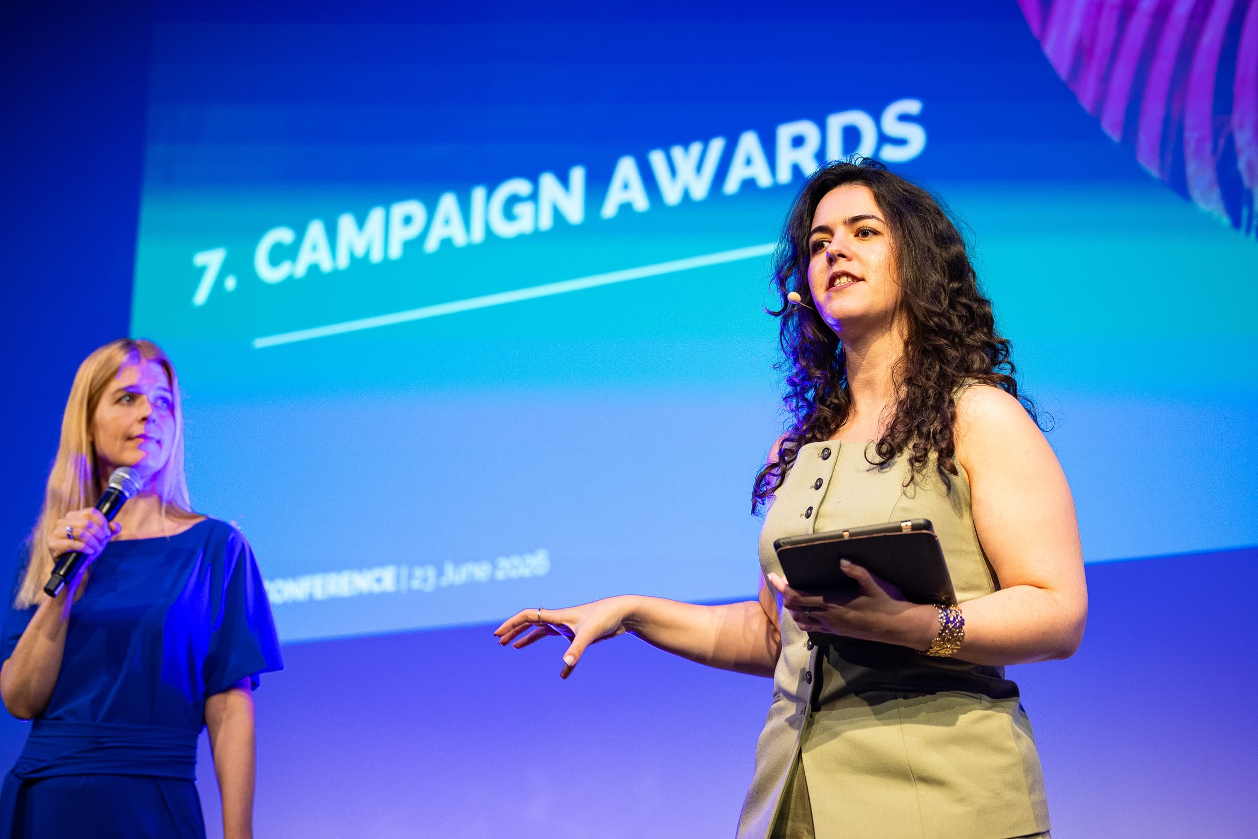 Professional moderators on stage at a European award show