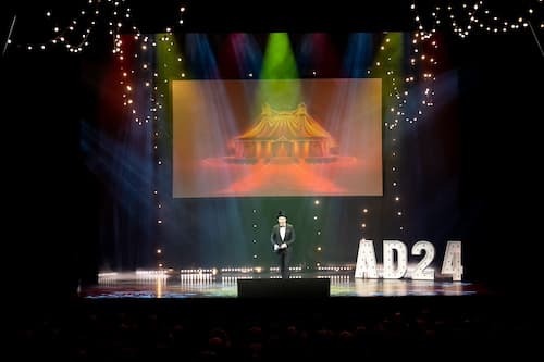 Professional moderators on stage at a European award show