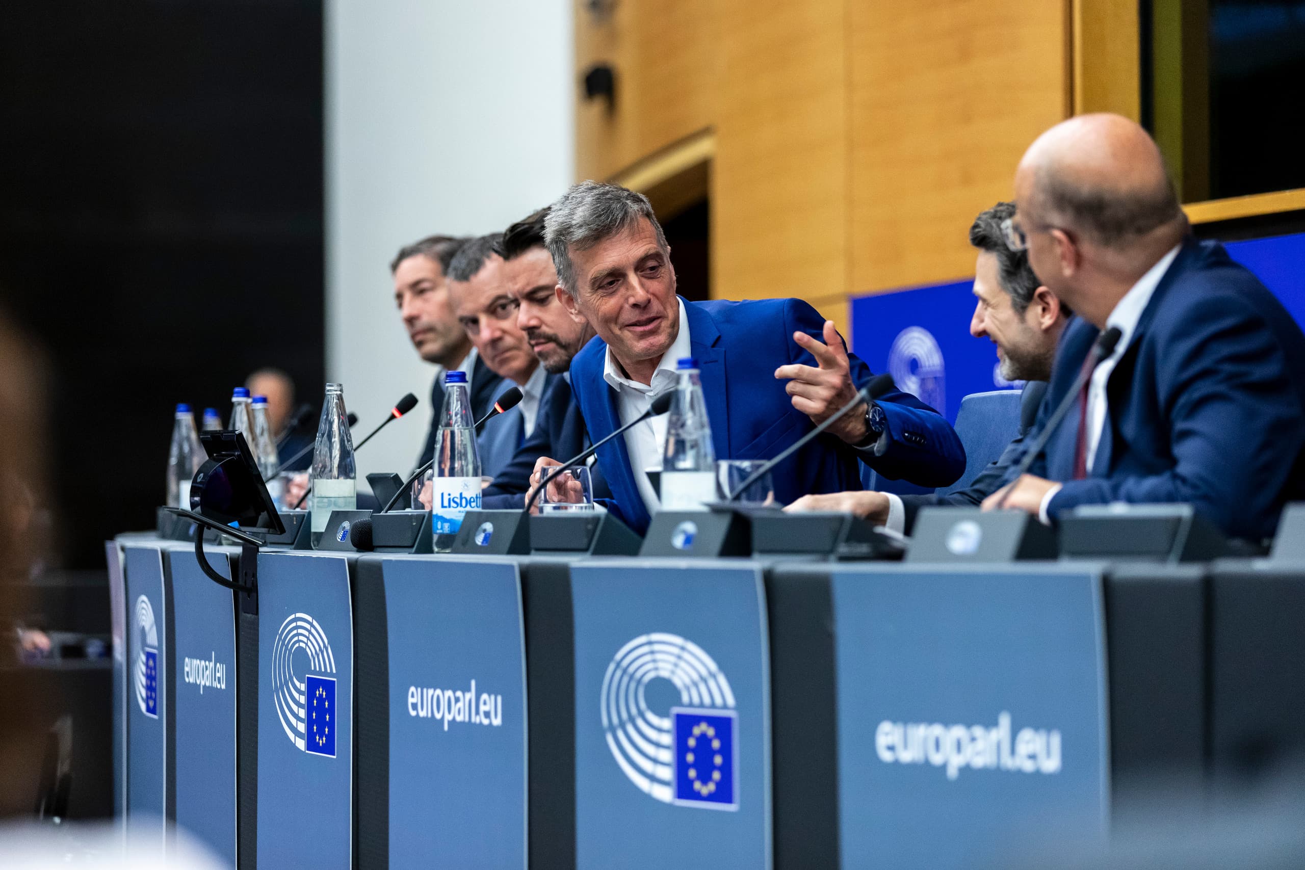 Moderators on stage during a European conference
